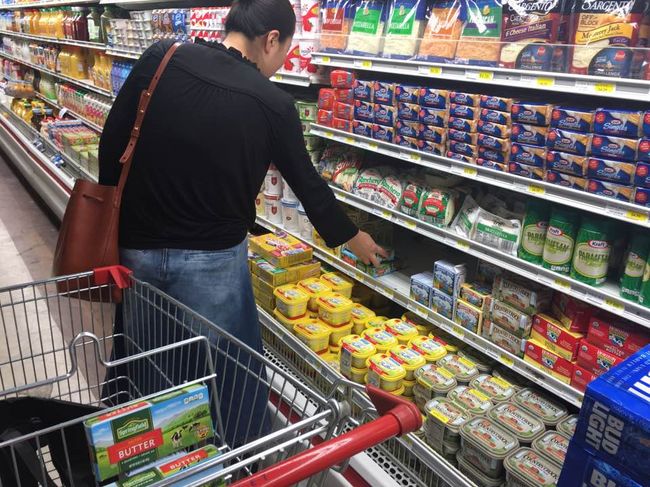 The high-fat diet, which has become popular in South Korea, is now one of the trending topics in Southern California. A woman is purchasing butter at a Koreatown market.
