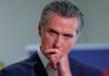 Gavin Newsom Regrets COVID Beach Closures, Calling Them ‘Insane in Hindsight’ California Governor Gavin Newsom signs school nutrition legislation at Belvedere Middle School in Los Angeles on October 8, 2025, highlighting statewide health and education reforms.