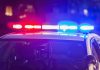 Glenview Sexual Assault Case Shakes Korean American Community Years Later Police patrol car roof with blue and red lights flashing during an investigation connected to findings by a Korean American medical examiner