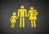 Bipartisan Paid Family Leave Bill Would Guarantee 6 Weeks Off yellow family sign