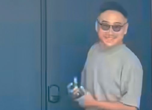 Won Suk Kim smiling at Dead Presidents during an encounter shown in an Instagram video.