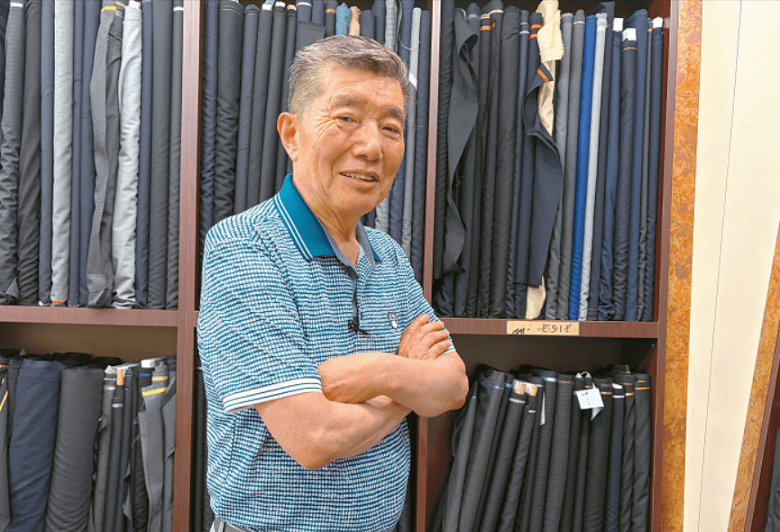 LA Koreatown tailor Goo Young Lim preparing his new shop