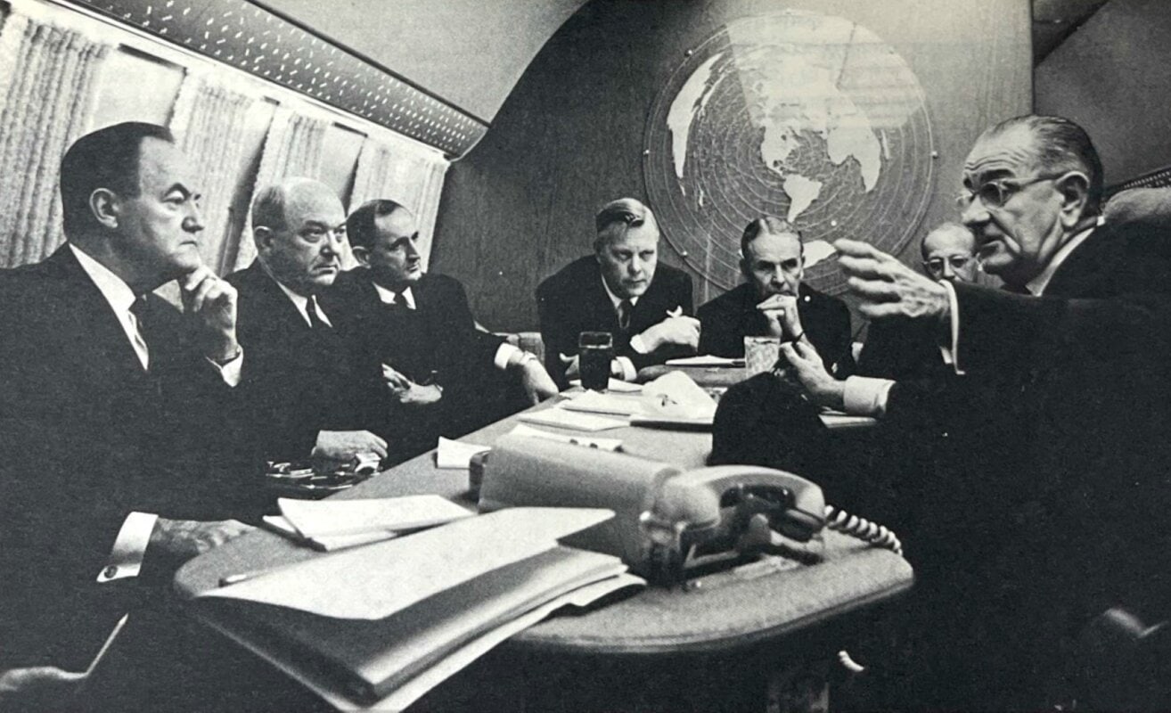 Alexis Johnson, fourth from left, attends a Vietnam War-era meeting aboard Air Force One with President Lyndon B. Johnson, far right.