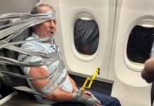 American Airlines unruly passenger — Duct-taped to seat after racist outburst American Airlines unruly passenger